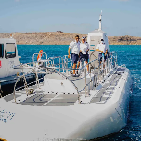 a boat is docked next to a body of water