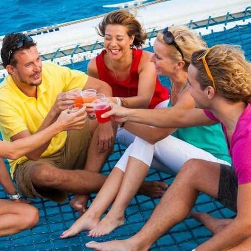 a group of people sitting in a pool of water