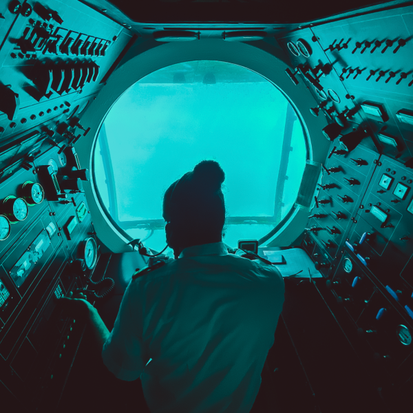 a man standing in front of a window