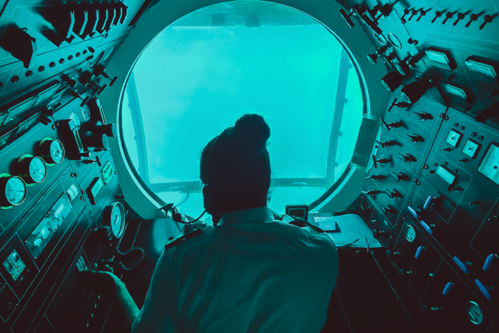 a man standing in front of a window