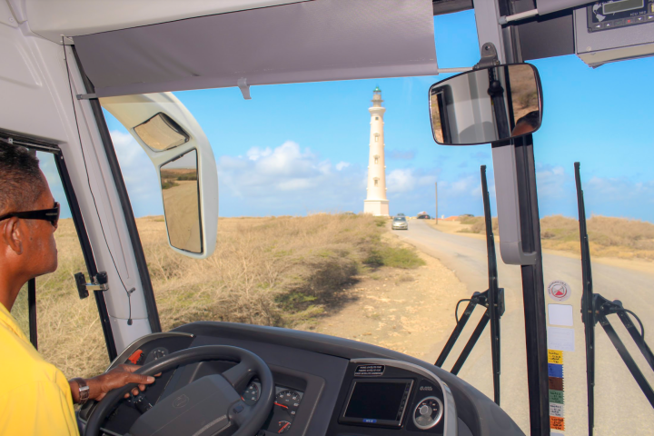 a man standing next to a car