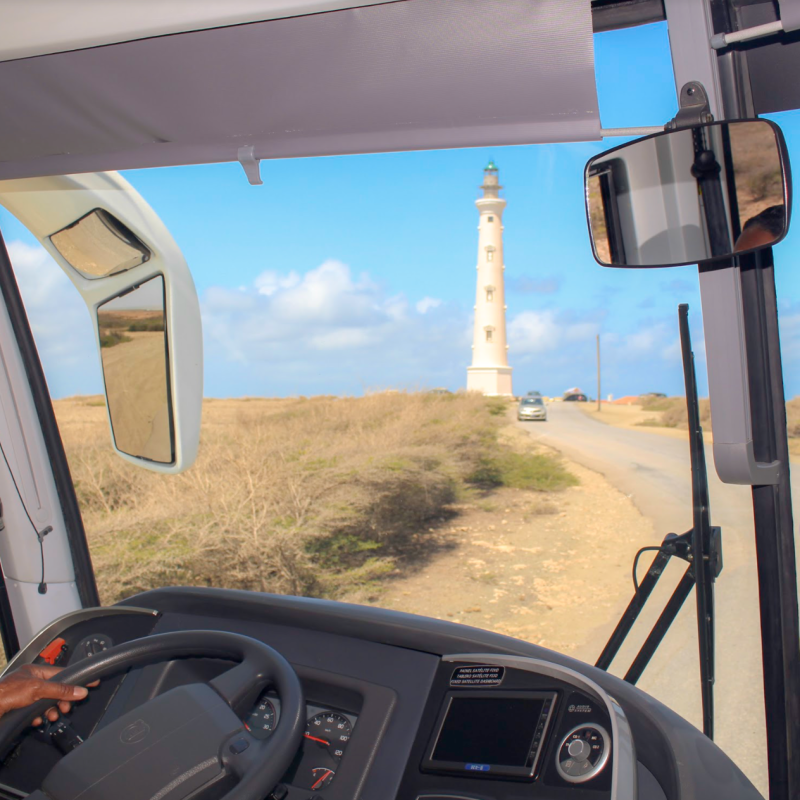 a man standing next to a car