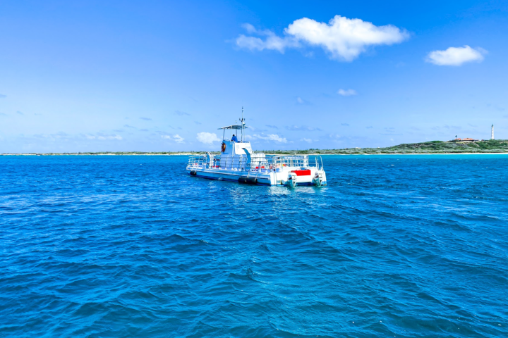 a small boat in a large body of water