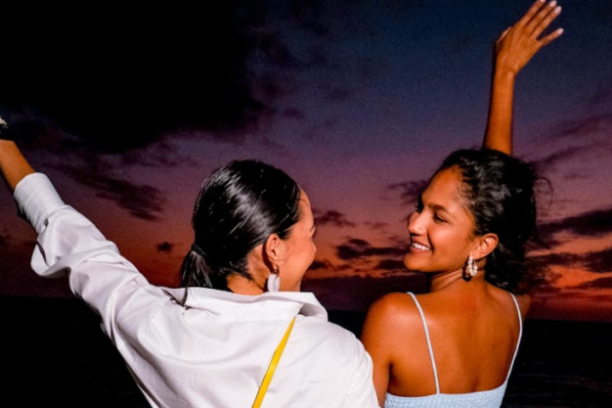 a person holding the hands up