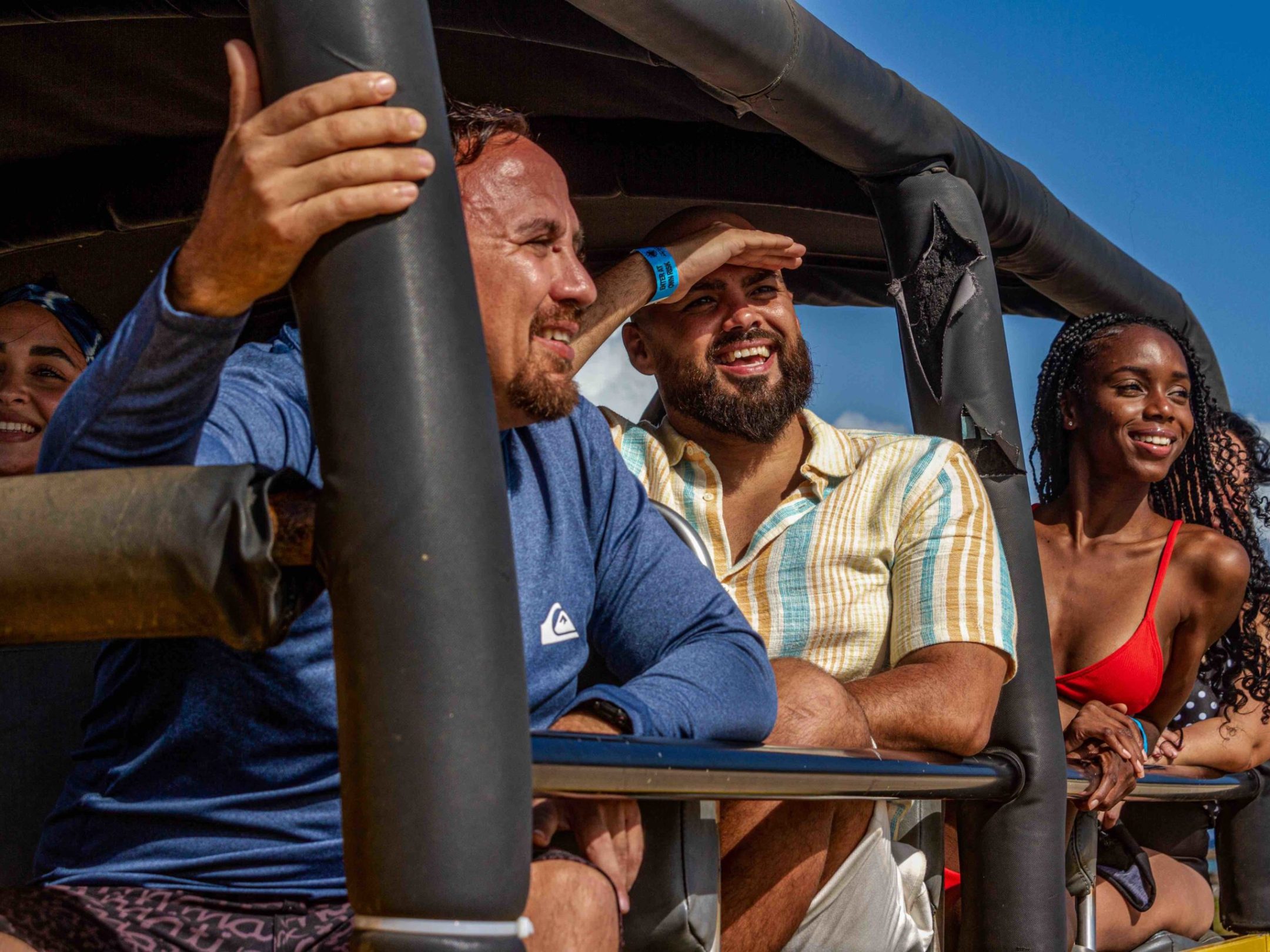 a group of people sitting on a bench