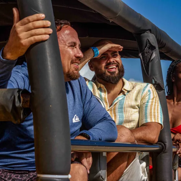 a group of people sitting on a bench