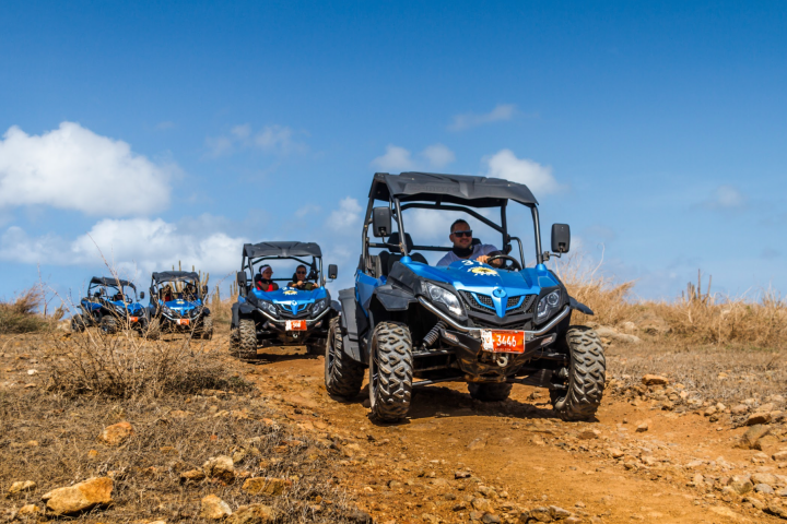 a tractor parked in the dirt