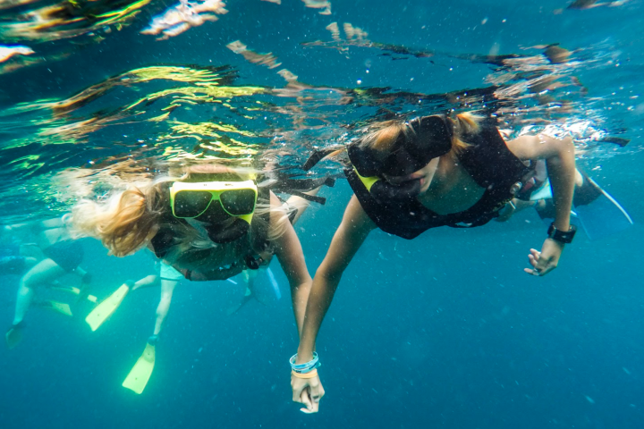 a person swimming in a pool of water