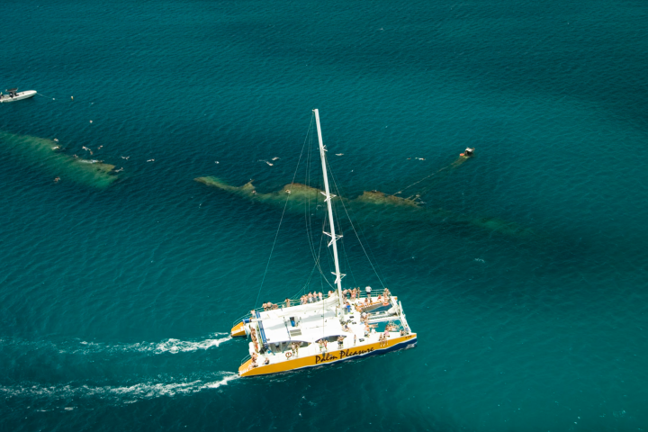 a small boat in a large body of water