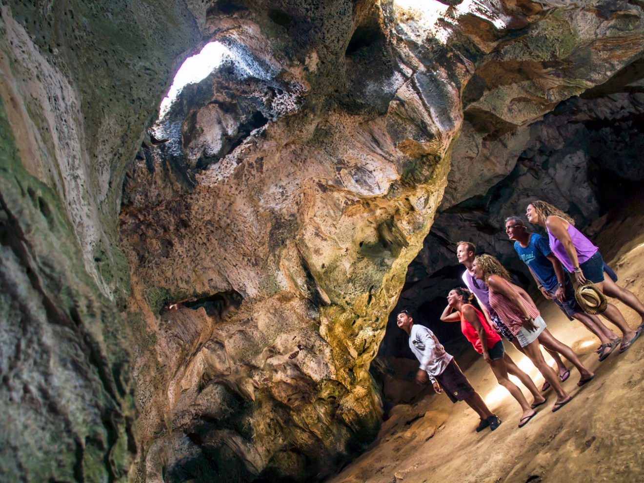 a person sitting on a rock