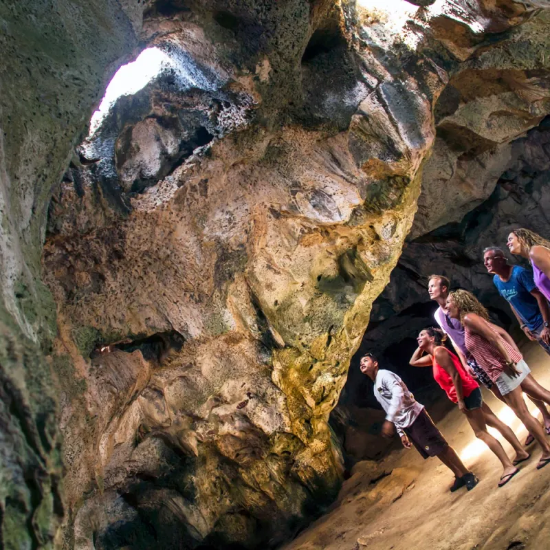 a person sitting on a rock