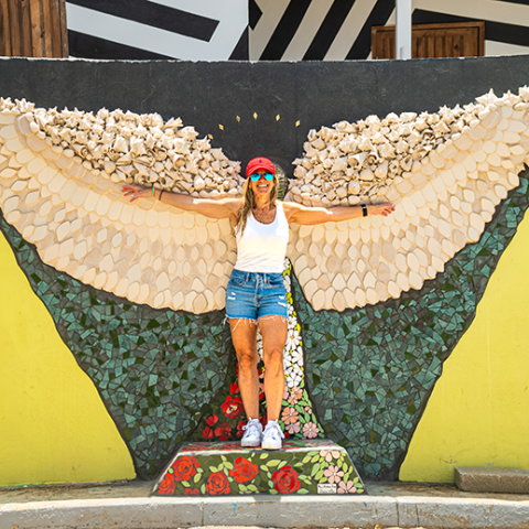posing for pictures during de palm tours jeep tour safari through san nicolas street art
