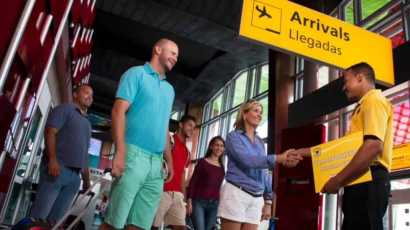 a group of people standing in front of a store