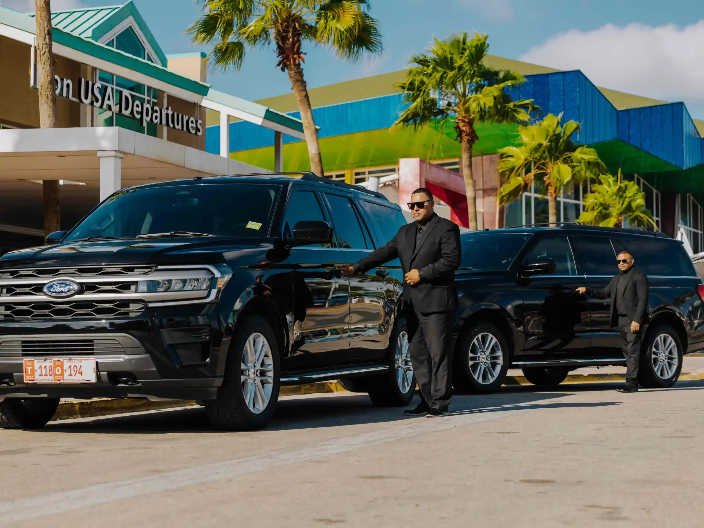 a truck is parked in front of a car