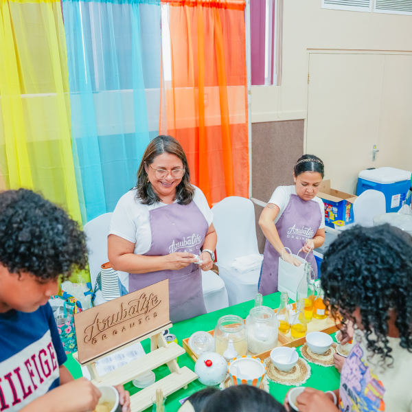 a group of people looking at a birthday party