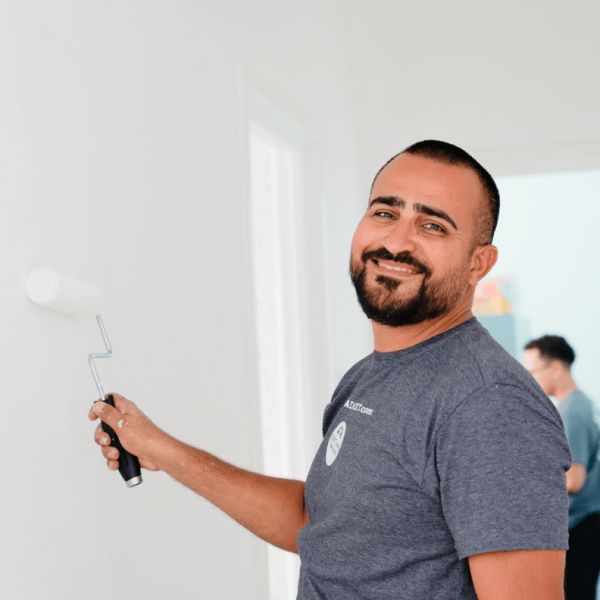 a man holding a wii remote in his hand