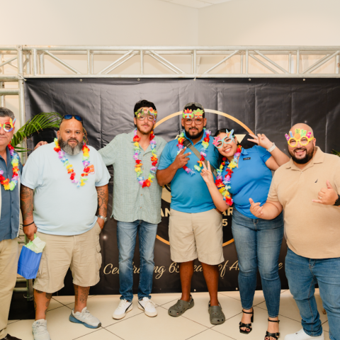 a group of people posing for the camera