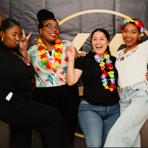 a group of people posing for the camera