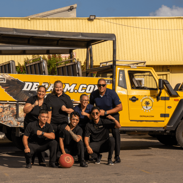 a group of people standing in front of a truck